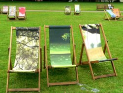 Designer deckchairs in St James Park, London Wallpaper
