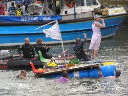 Raft race at Feast Week in Mevagissey, Cornwall Wallpaper