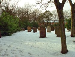 Graveyard in the snow, Great Yarmouth, Norfolk Wallpaper