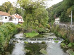 Small river running through Cheddar town, Somerset Wallpaper