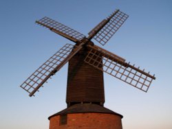 Brill windmill in setting sun Wallpaper