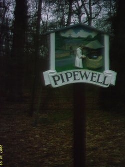 Pipewell Village Sign