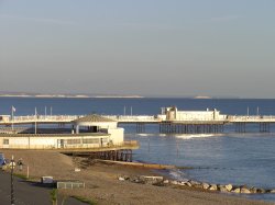 Worthing Pier with Distant Cliffs Wallpaper