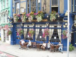 Cheerful, flower-bedecked pub, London Wallpaper