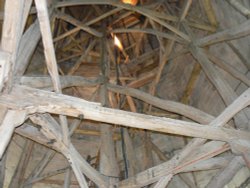 The wooden beams Inside the spire, Salisbury Cathedral, Wiltshire Wallpaper
