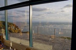 The Cafe by the Lighthouse Wallpaper