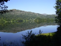 Septermber Morning reflections on Grasmere, Cumbria Wallpaper