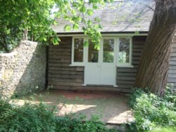 Virginia Woolf's writing room in the garden at Monks House, Lewes, East Sussex
