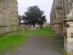 Elstow Church taken between the clock/bell tower and church itself.