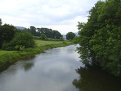 The River as seen from the bridge at Pooley Bridge. Cumbria. Wallpaper