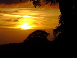 Setting sun and silky sky