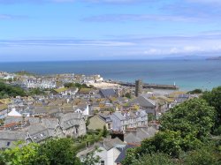 St Ives with Godrevy lighthouse in the distance Wallpaper