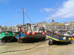 Boats beached in St Ives harbour at low tide Wallpaper