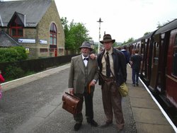 The man with the hat is back and this time he's bringing his dad!