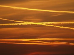 Contrails over Steeple Claydon, Bucks. Wallpaper