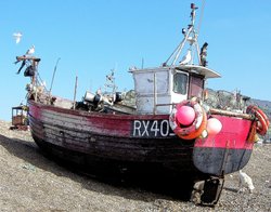 Fishing boats on the shore Wallpaper