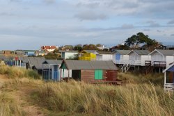 Beach huts in the dunes Wallpaper