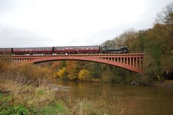 Steam train over the Victoria Bridge at Arley