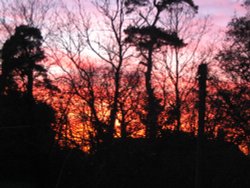 Beautiful sunset from bedroom window Wallpaper