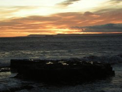 Sunrise lighthouse corner Wallpaper