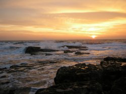 Sunrise on  light house corner Wallpaper