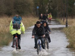 Cyclists in floodwater, the Parks, Oxford Wallpaper