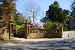 The entrance to Minterne Gardens and Manor House at Minterne Magna Wallpaper