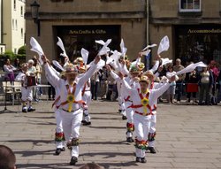 Morris dancers by the Abbey. Wallpaper