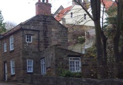 House on a narrow street in Whitby Wallpaper