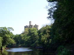 Warkworth Castle from along the River Coquet