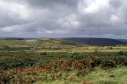 Looking across a cloud covered moor. Wallpaper