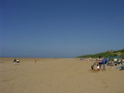 The beach (uncrowded, safe and sandy) Wallpaper