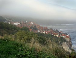 Mist rolling in over Robin Hood's Bay