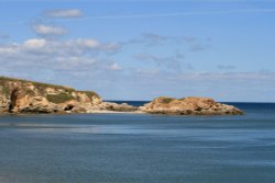 The beach and cliffs at Marsden Bay. Wallpaper