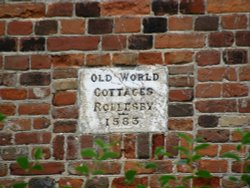 Plaque on a house near the Church, house was surrounded by trees which prevented a picture of it