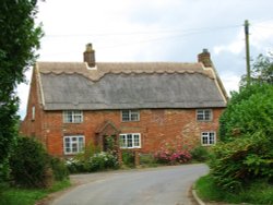 Thatched cottages in Thurne Wallpaper
