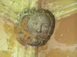 Ceiling boss of the Green Man at Lacock Abbey Wallpaper