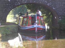 Horse-drawn barge near Tiverton, moored under a bridge