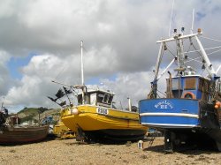 Fishing boats on the beach at Hastings Wallpaper