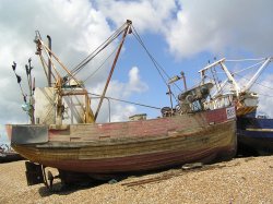 Fishing boat on the beach at Hastings Wallpaper