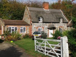 Thatch and Stone Cottage. Wallpaper