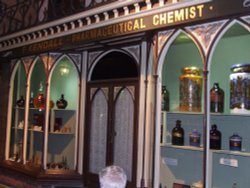 Victorian street: Pharmaceutical Chemist Wallpaper