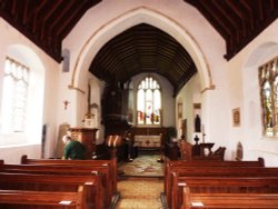 Church Interior, the cleaner was busy at work. Wallpaper
