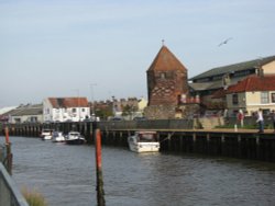 The River Yare. The tower is part of the old wall Wallpaper