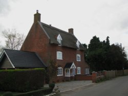 House in the village Wallpaper