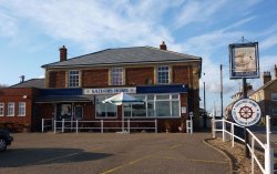 The Sailors Home Pub near the beach Wallpaper