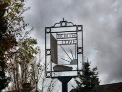 Village sign on the green Wallpaper