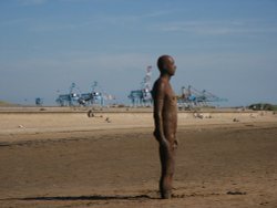 Anthony Gormley's Iron Men Wallpaper