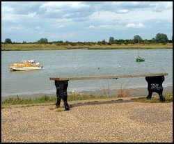 Bench and boat at Maldon Wallpaper