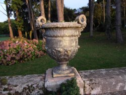 Urn in late afternoon sun. Wallpaper